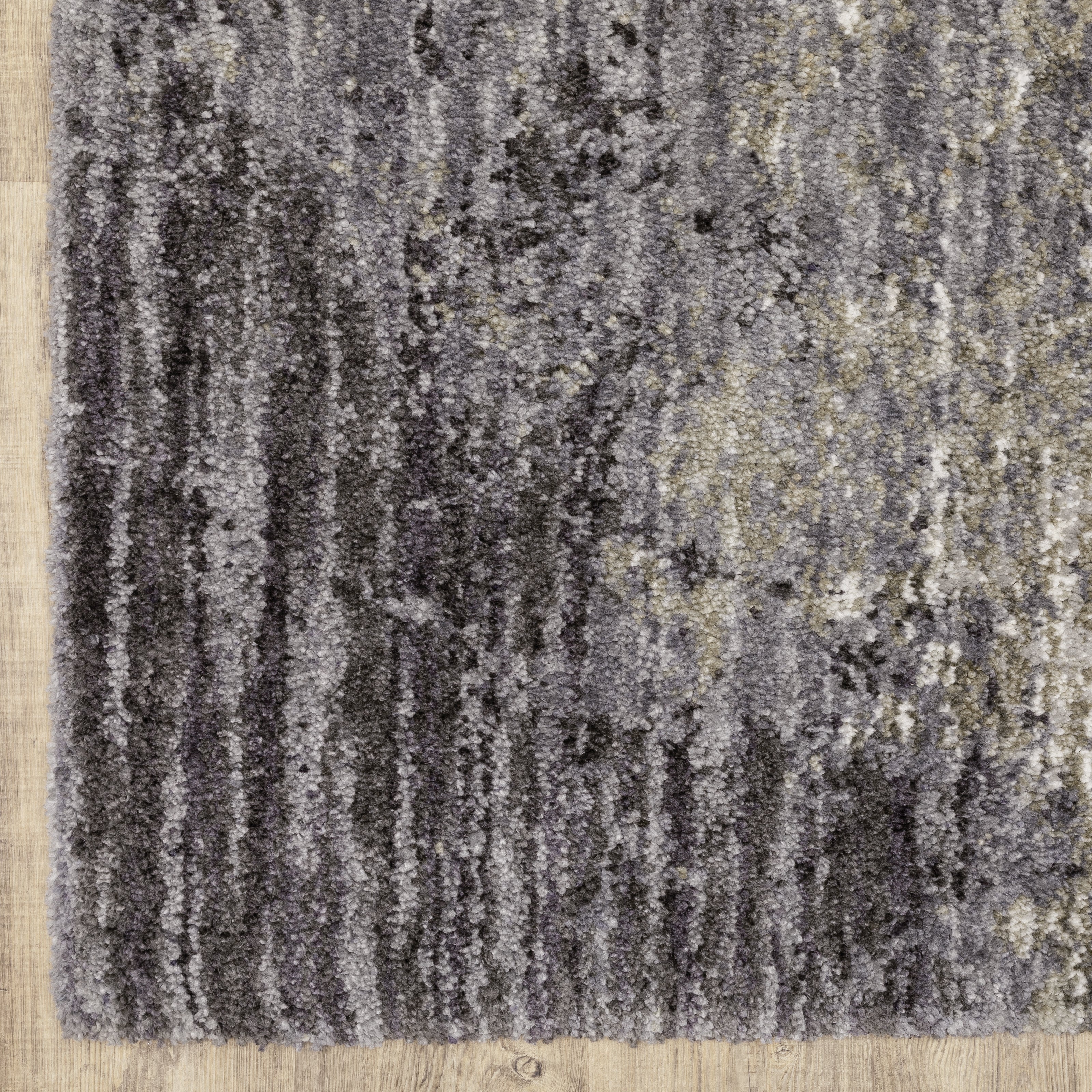 Oriental Weavers Aspen 2060W plush shag rug featuring abstract pattern in grey/ ivory tones