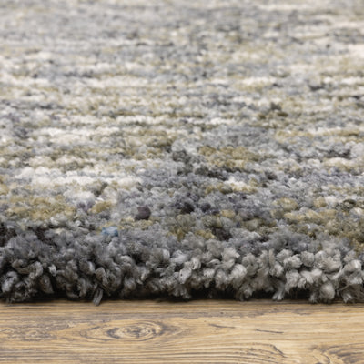 Oriental Weavers Aspen 2060W plush shag rug featuring abstract pattern in grey/ ivory tones