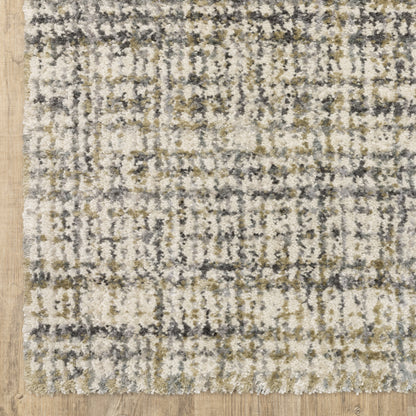 Oriental Weavers Aspen 2877B plush shag rug featuring abstract pattern in ivory/ gold tones