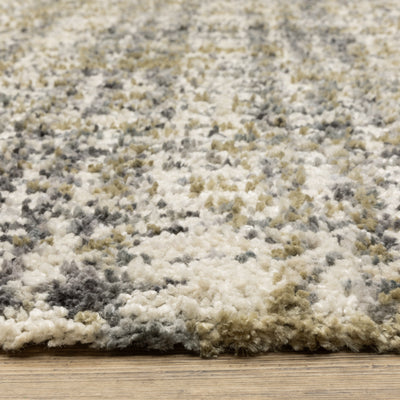 Oriental Weavers Aspen 2877B plush shag rug featuring abstract pattern in ivory/ gold tones