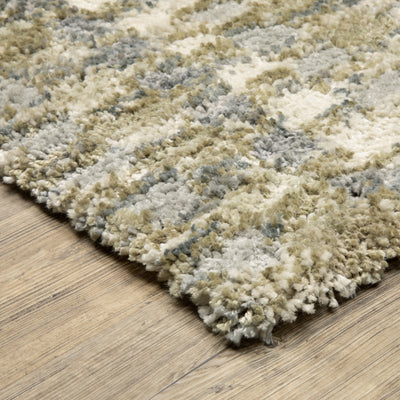 Oriental Weavers Aspen 3052A plush shag rug featuring abstract pattern in gold/ grey tones