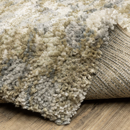 Oriental Weavers Aspen 3052A plush shag rug featuring abstract pattern in gold/ grey tones