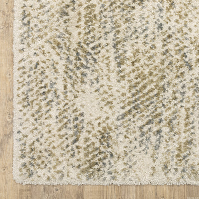Oriental Weavers Aspen 3154E plush shag rug featuring abstract pattern in ivory/ gold tones