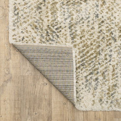 Oriental Weavers Aspen 3154E plush shag rug featuring abstract pattern in ivory/ gold tones