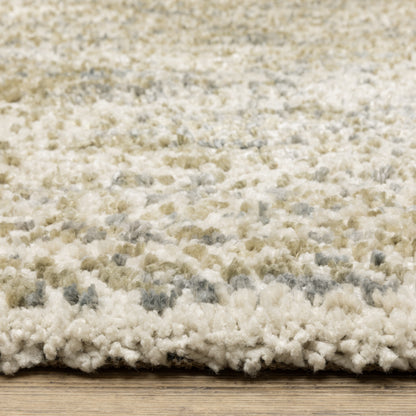 Oriental Weavers Aspen 3154E plush shag rug featuring abstract pattern in ivory/ gold tones