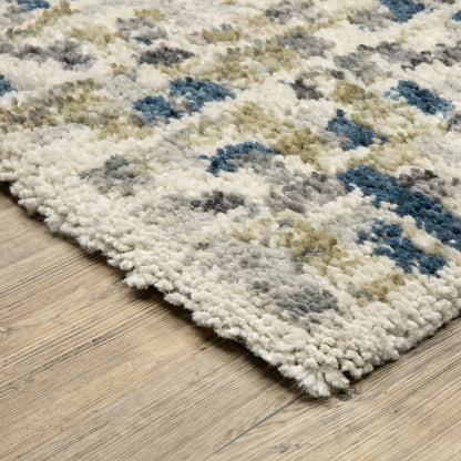 Oriental Weavers Aspen 3514A plush shag rug featuring abstract pattern in ivory/ blue tones