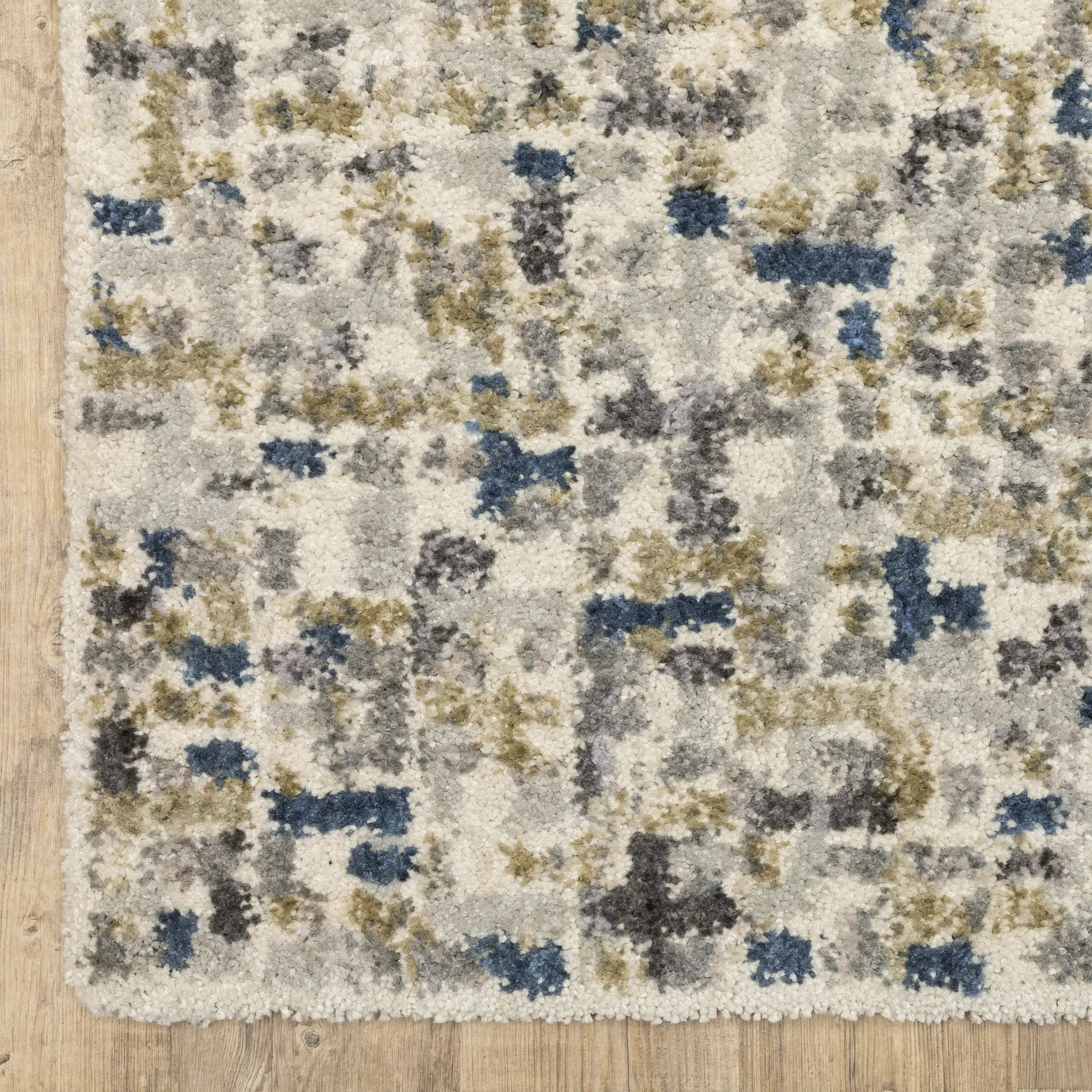 Aspen 3514A Ivory/ Blue Area Rug by Oriental Weavers