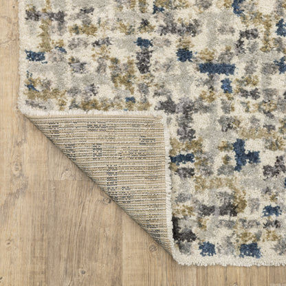 Oriental Weavers Aspen 3514A plush shag rug featuring abstract pattern in ivory/ blue tones