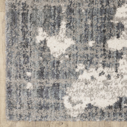 Oriental Weavers Aspen 003H9 plush shag rug featuring abstract pattern in grey/ ivory tones