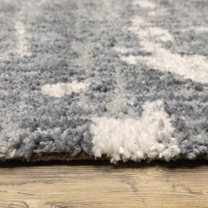 Oriental Weavers Aspen 003H9 plush shag rug featuring abstract pattern in grey/ ivory tones