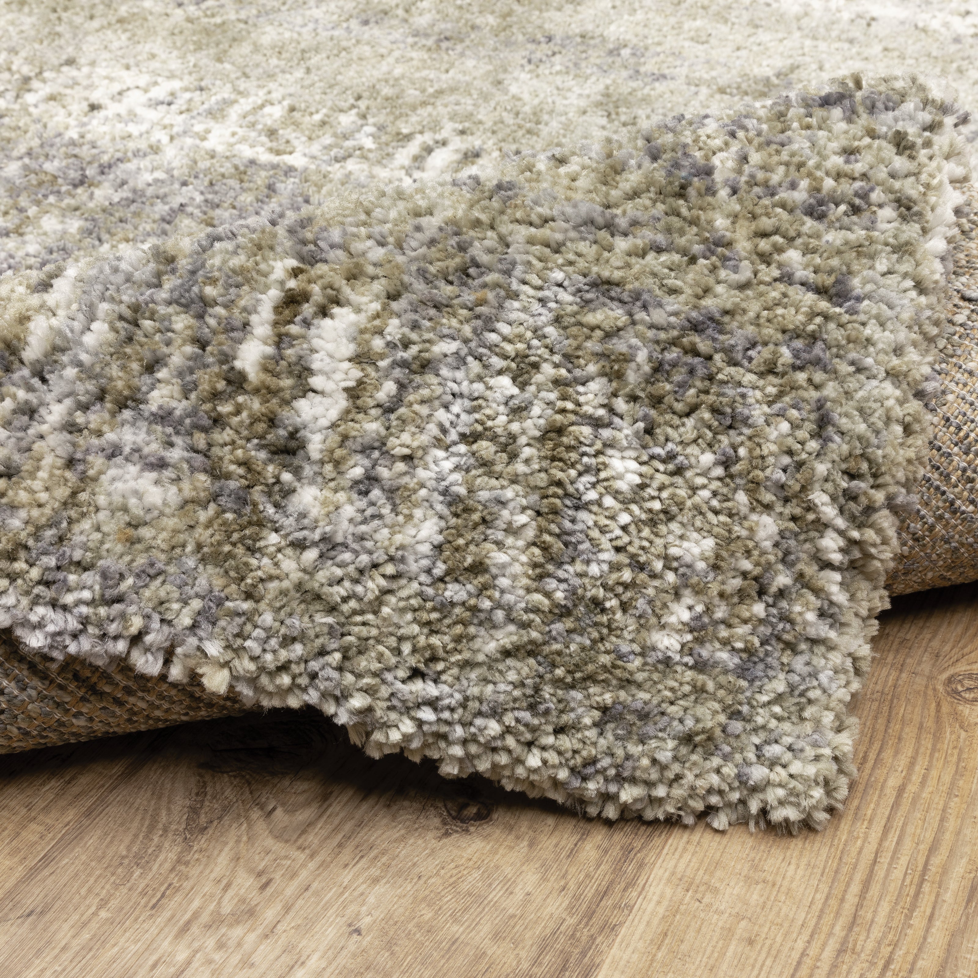 Oriental Weavers Aspen 530J9 plush shag rug featuring abstract pattern in grey/ ivory tones