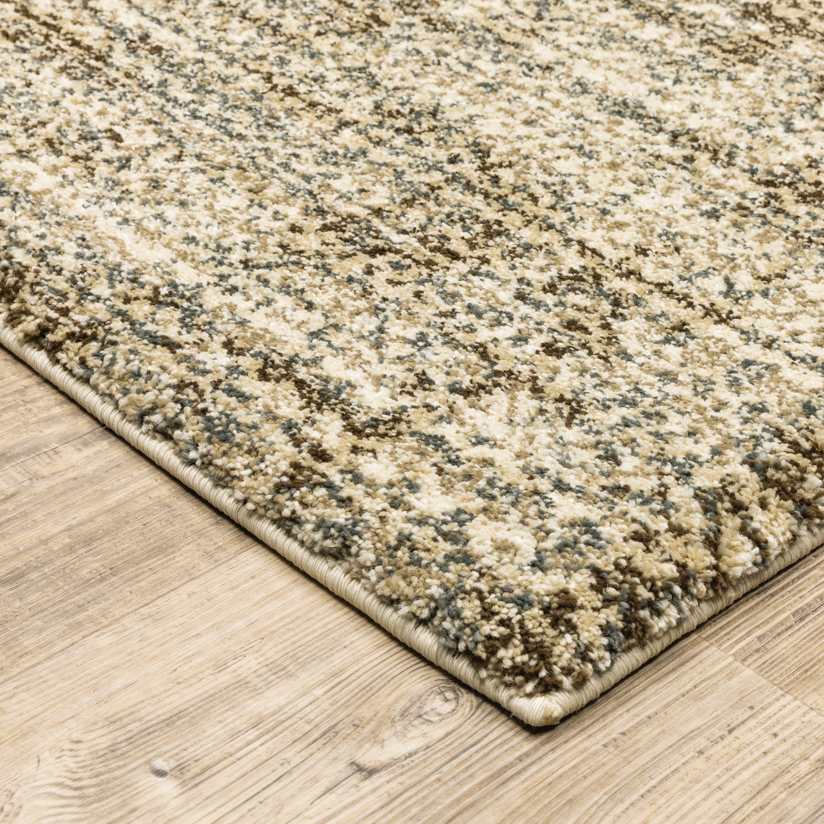 Oriental Weavers Astor 1449M plush modern rug featuring abstract pattern in beige/ brown tones