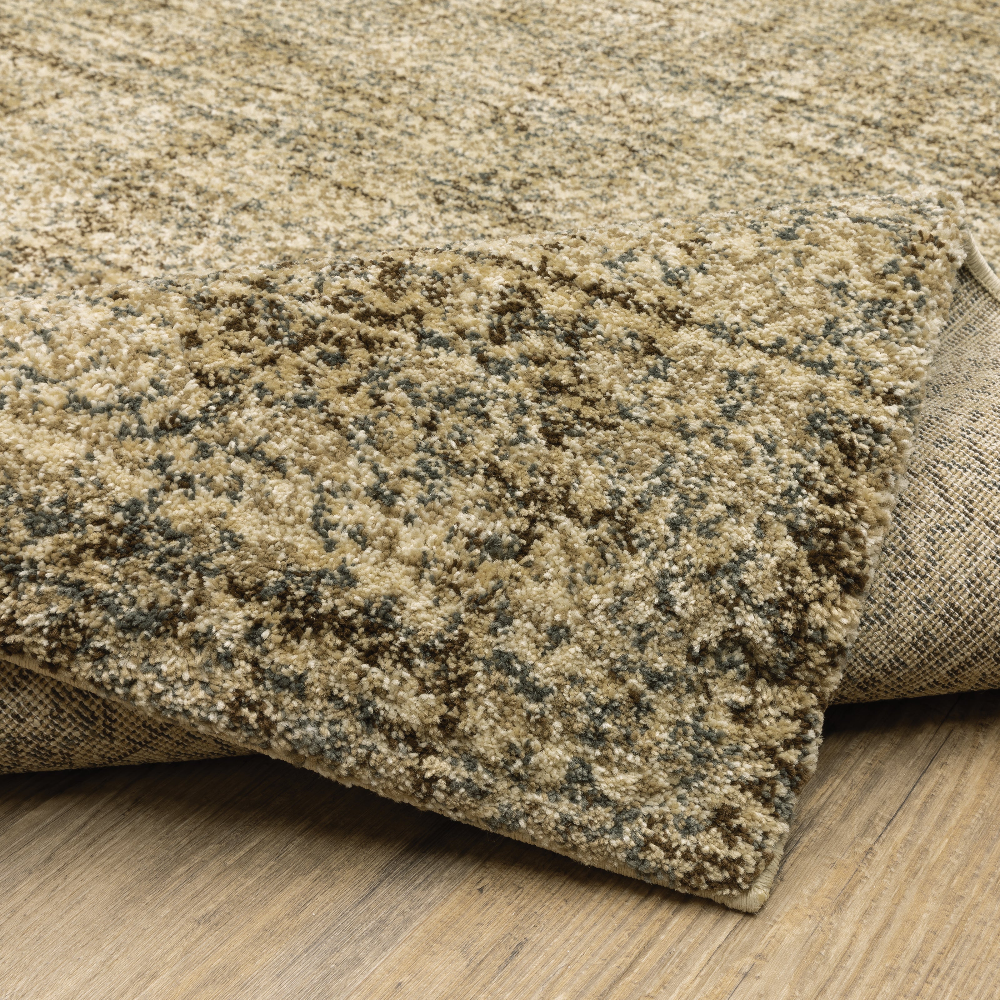 Oriental Weavers Astor 1449M plush modern rug featuring abstract pattern in beige/ brown tones