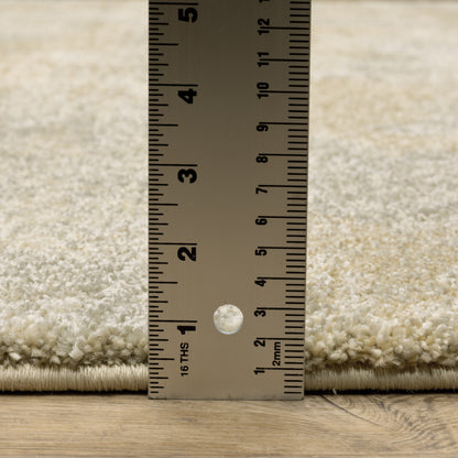 Oriental Weavers Astor 2268J plush modern rug featuring abstract pattern in beige/ grey tones