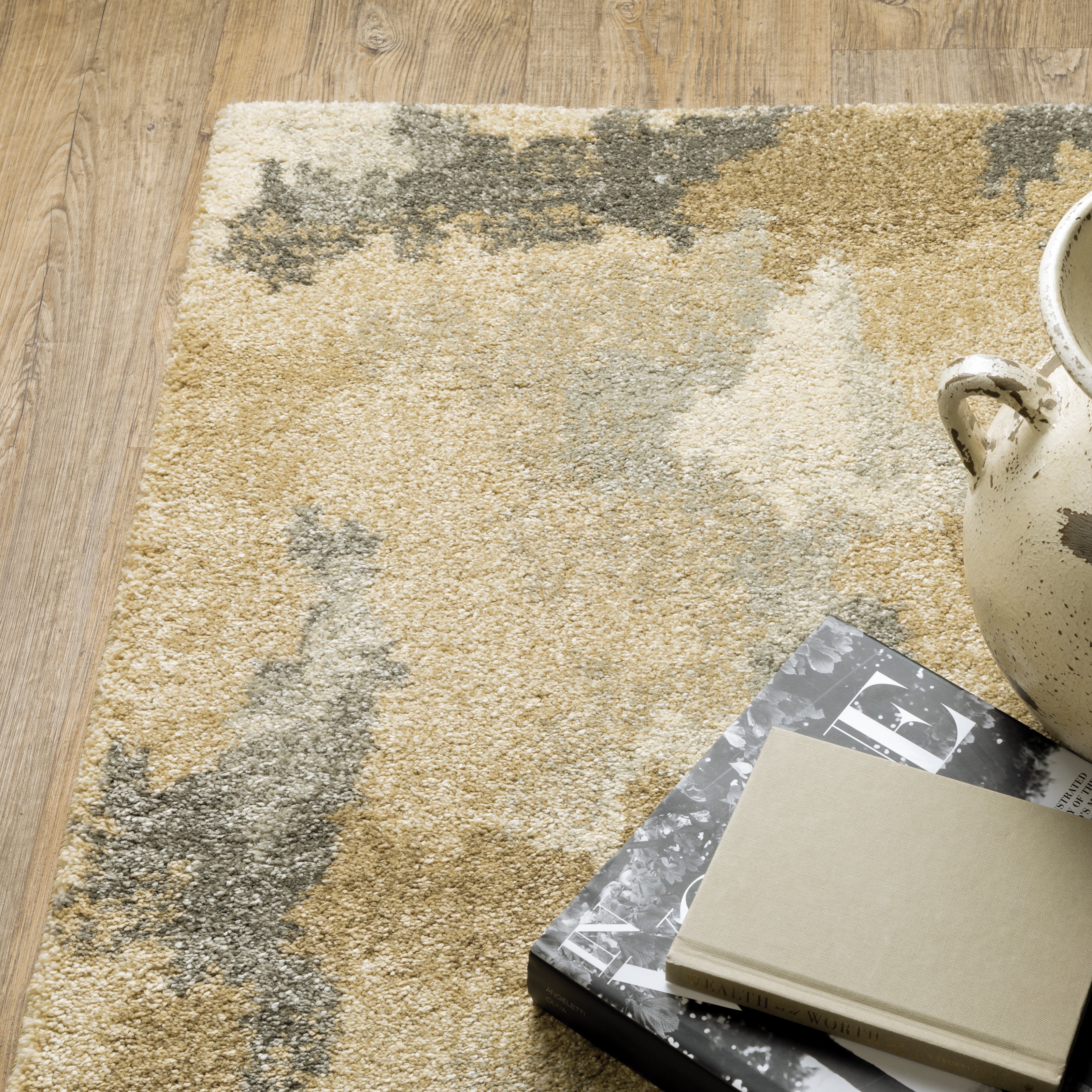 Oriental Weavers Astor 2268Z plush modern rug featuring abstract pattern in beige/ gold tones