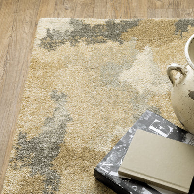 Oriental Weavers Astor 2268Z plush modern rug featuring abstract pattern in beige/ gold tones