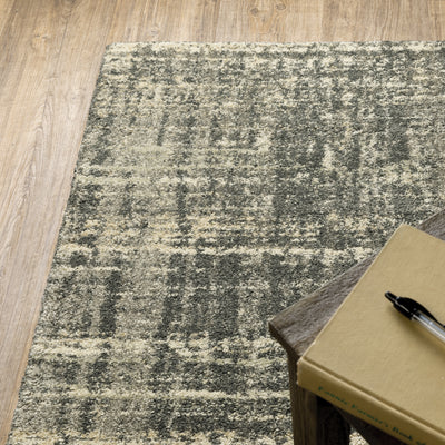 Oriental Weavers Astor 2541M plush modern rug featuring abstract pattern in charcoal/ beige tones
