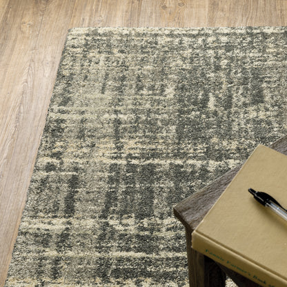 Oriental Weavers Astor 2541M plush modern rug featuring abstract pattern in charcoal/ beige tones