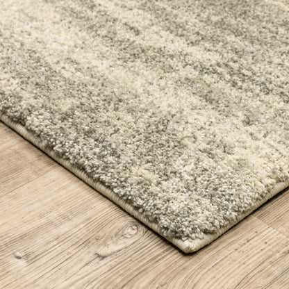 Oriental Weavers Astor 5572E plush modern rug featuring abstract pattern in grey/ beige tones