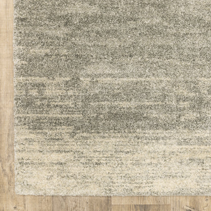 Oriental Weavers Astor 5572E plush modern rug featuring abstract pattern in grey/ beige tones