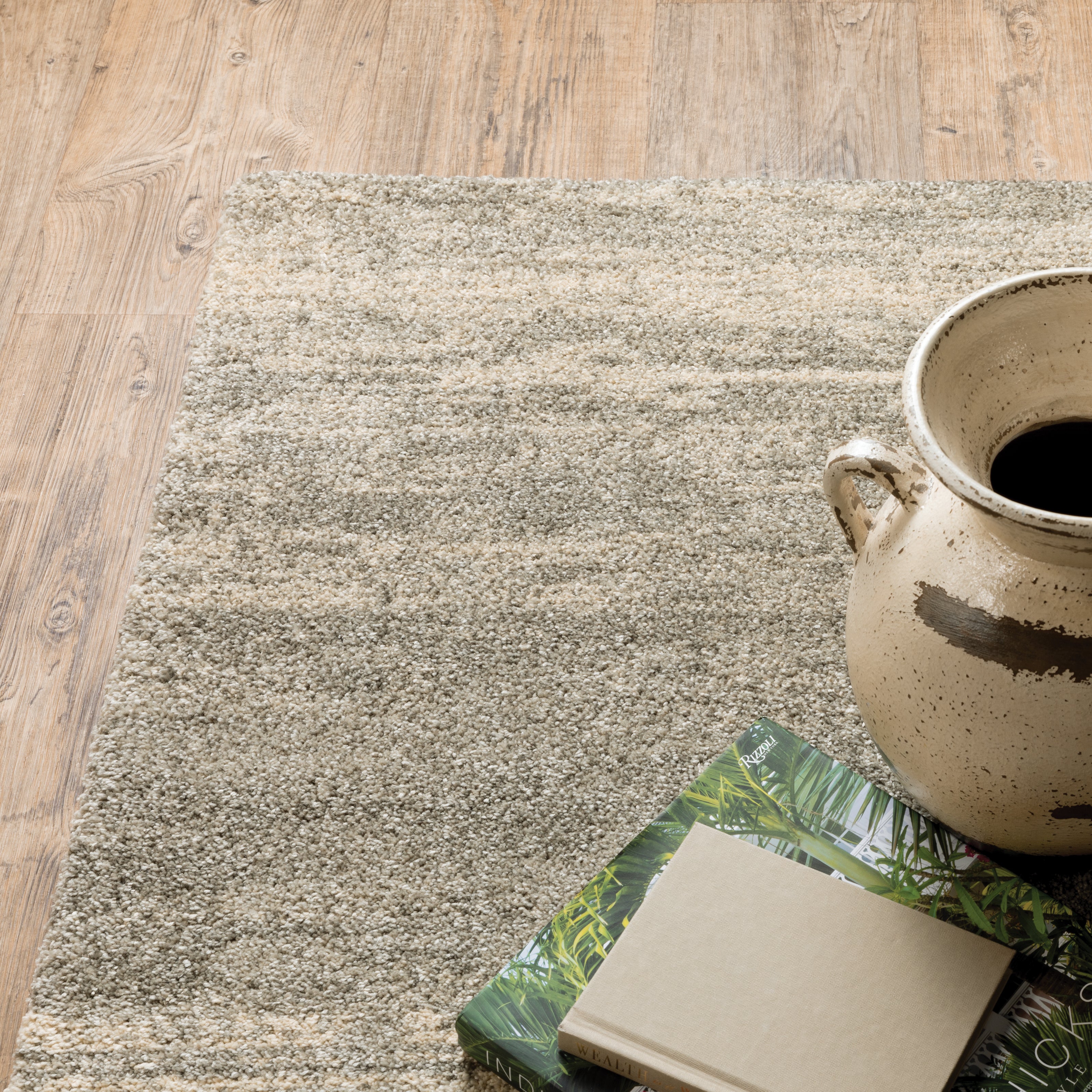 Oriental Weavers Astor 5572E plush modern rug featuring abstract pattern in grey/ beige tones