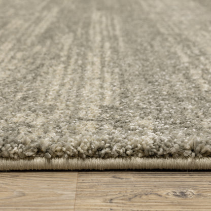 Oriental Weavers Astor 5572E plush modern rug featuring abstract pattern in grey/ beige tones