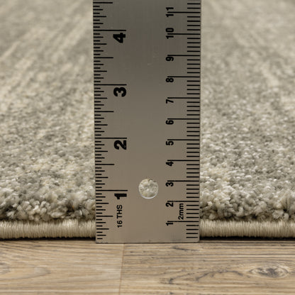 Oriental Weavers Astor 5572E plush modern rug featuring abstract pattern in grey/ beige tones
