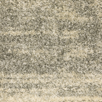 Oriental Weavers Astor 5572E plush modern rug featuring abstract pattern in grey/ beige tones