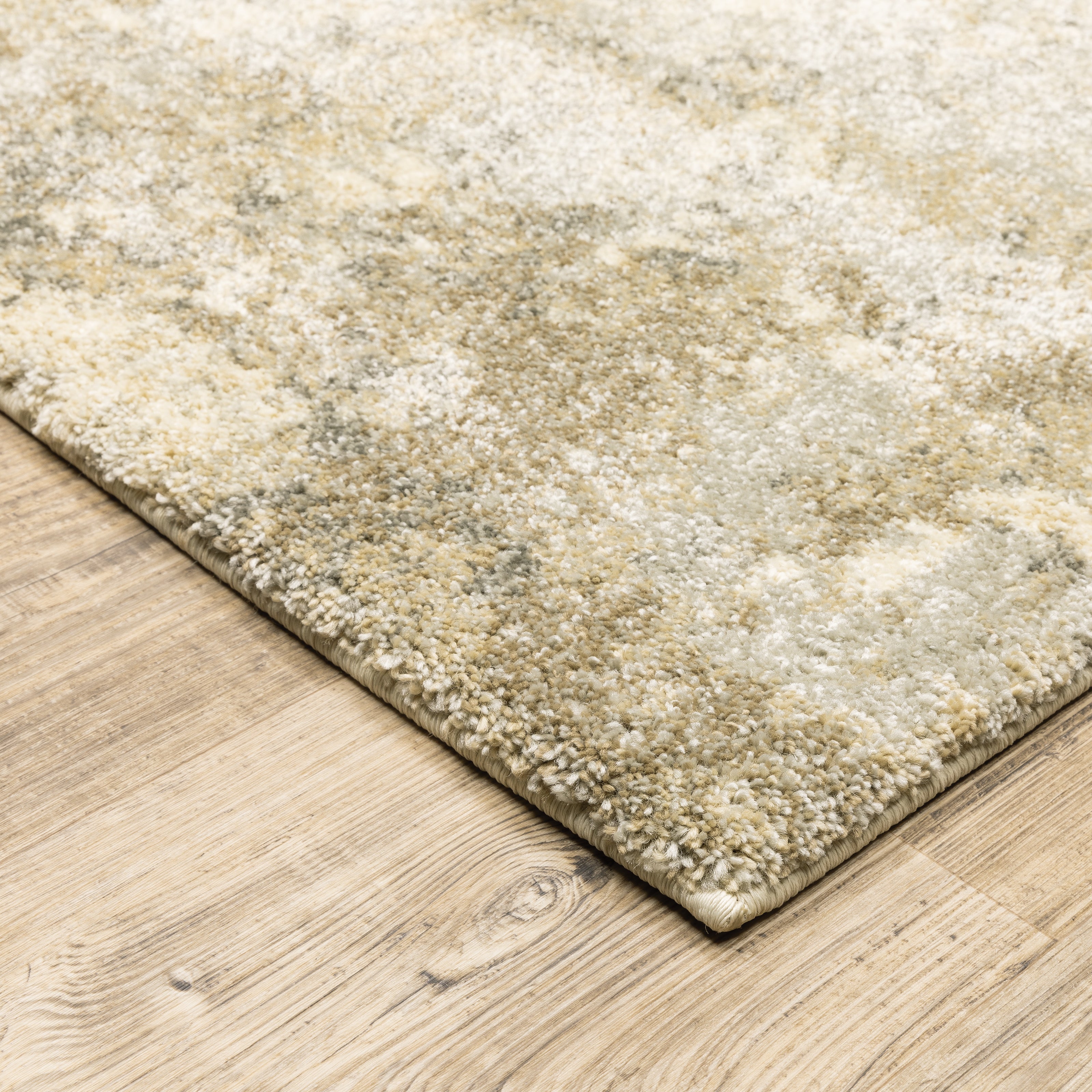 Oriental Weavers Astor 8322J plush modern rug featuring abstract pattern in gold/ beige tones