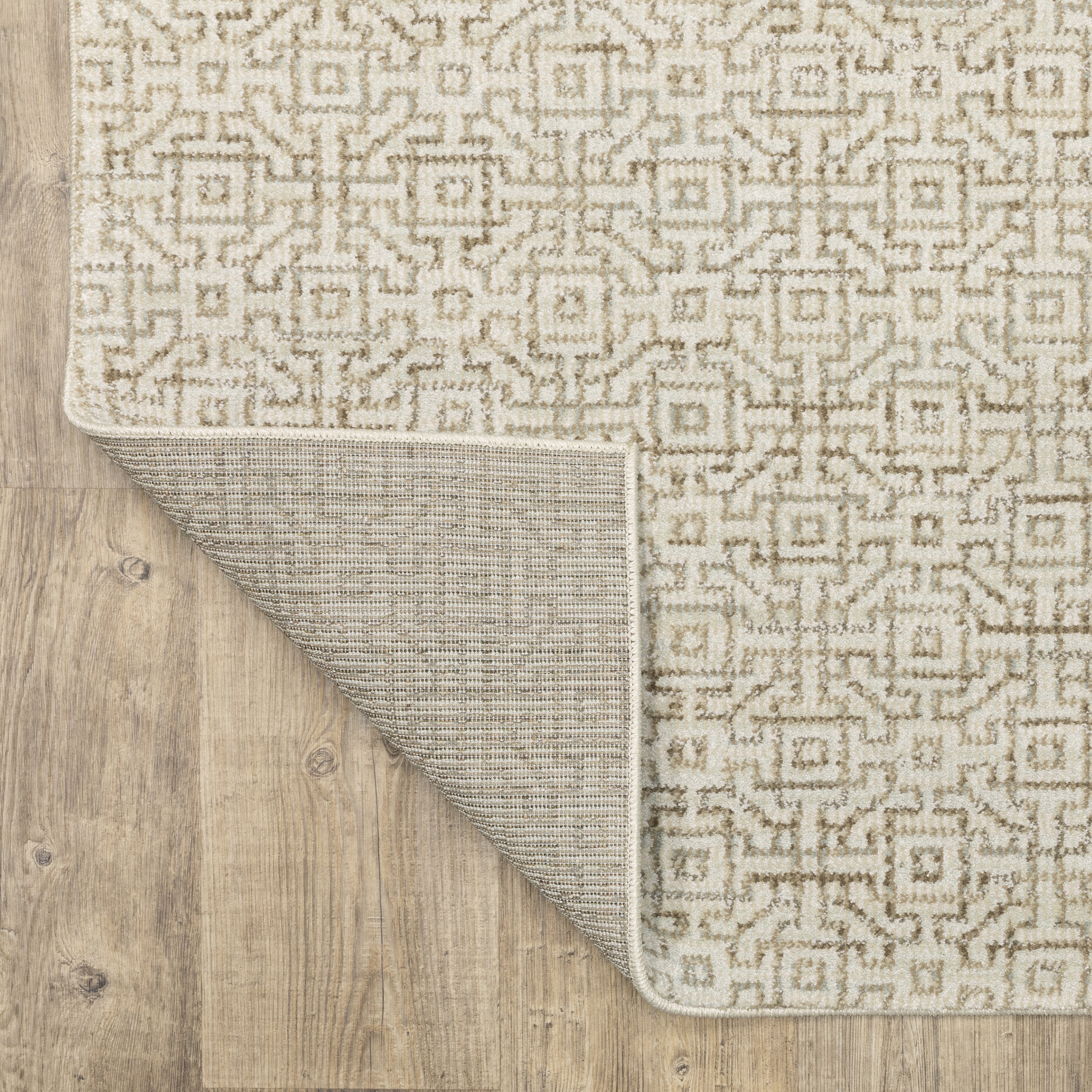 Oriental Weavers Atlas 3721G textured traditional rug featuring textured design in ivory/ beige tones