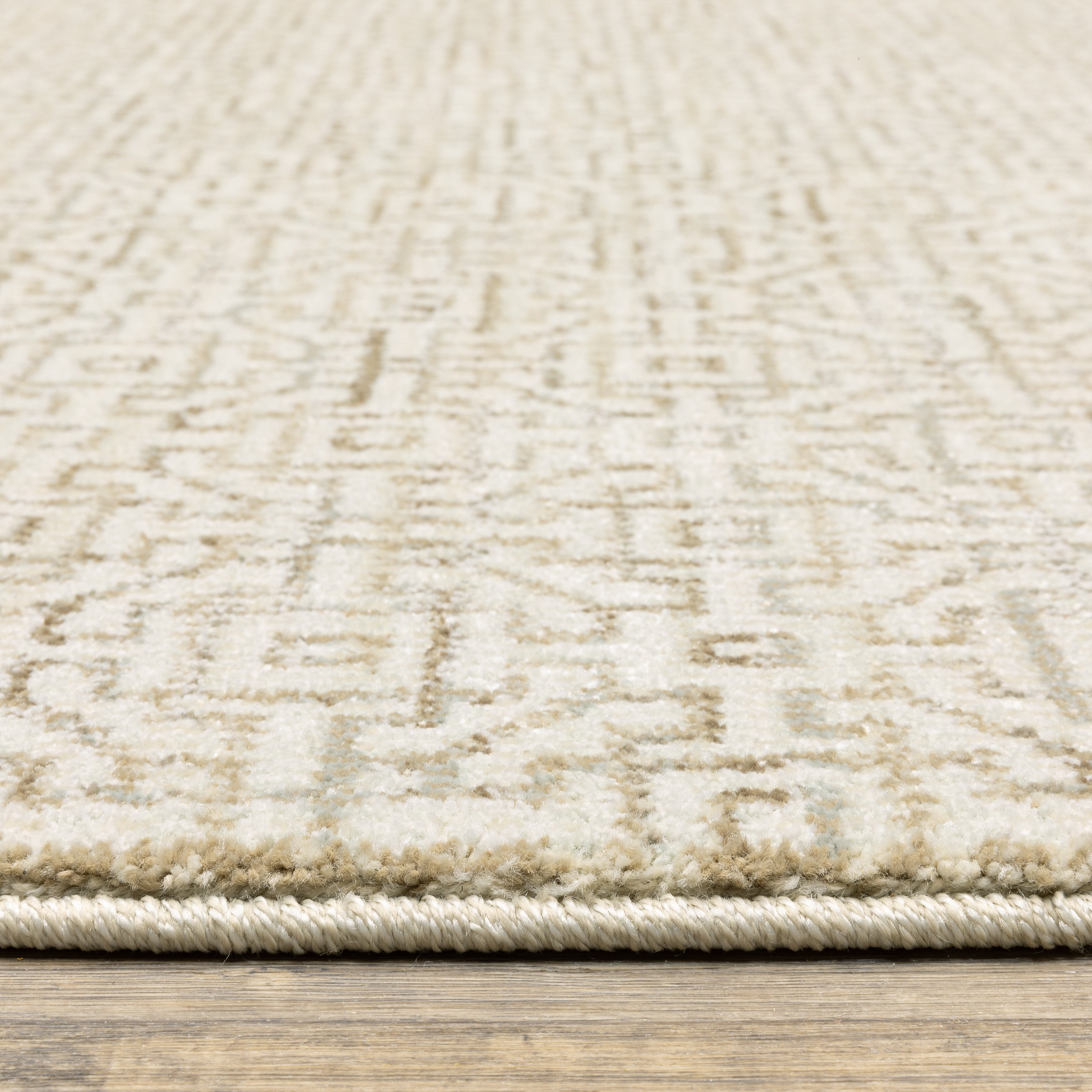 Oriental Weavers Atlas 3721G textured traditional rug featuring textured design in ivory/ beige tones