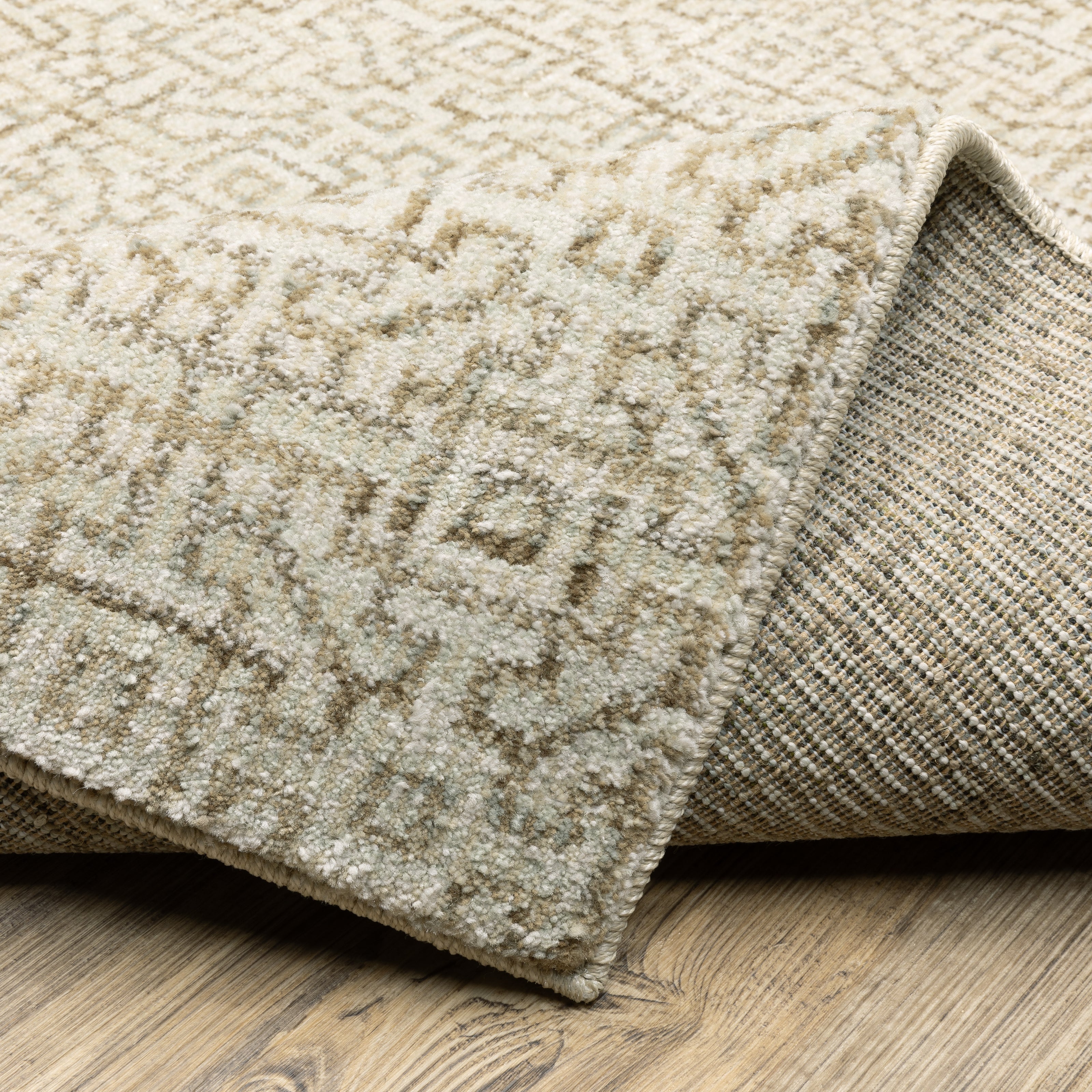 Oriental Weavers Atlas 3721G textured traditional rug featuring textured design in ivory/ beige tones