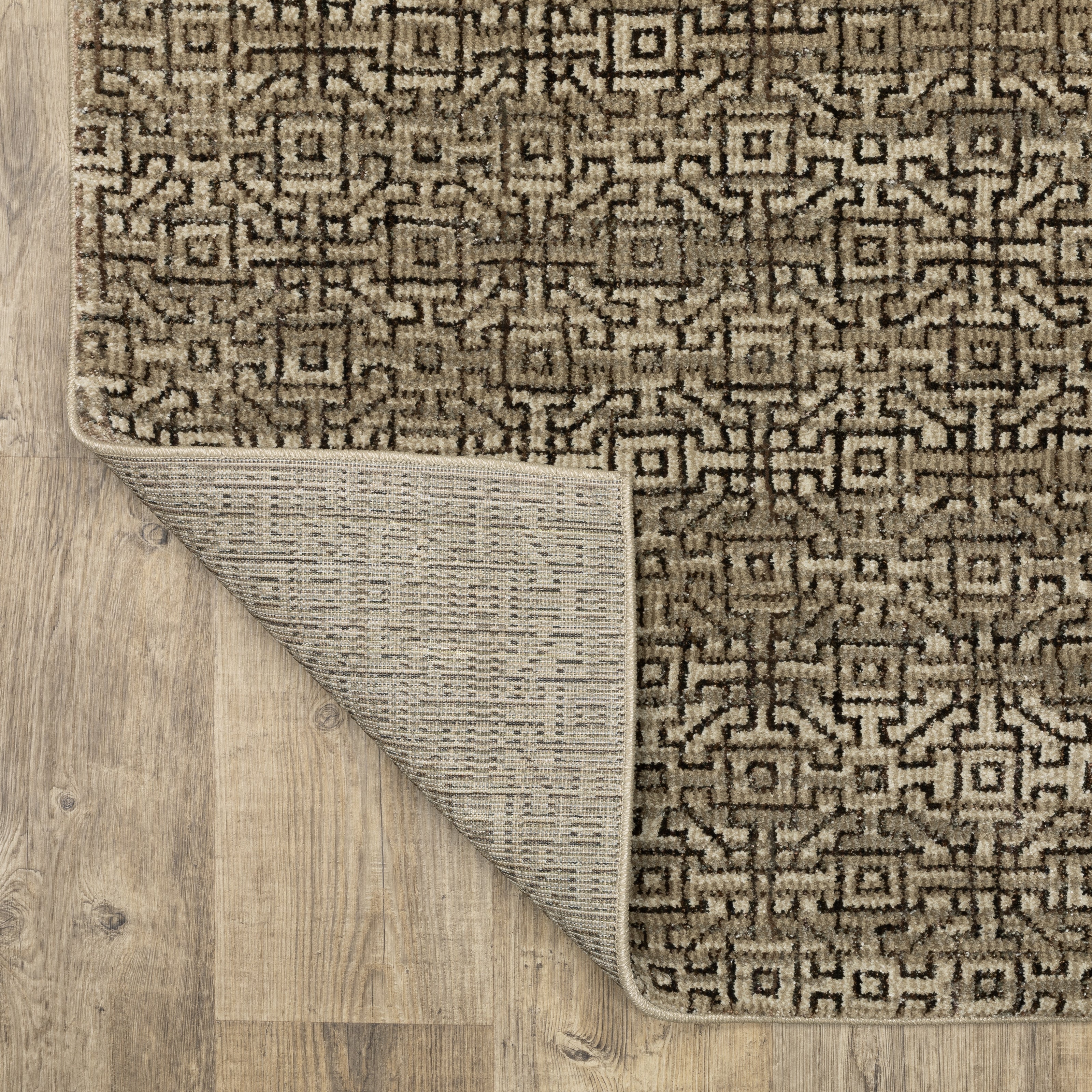Oriental Weavers Atlas 3721S textured modern rug featuring textured design in brown/ tan tones