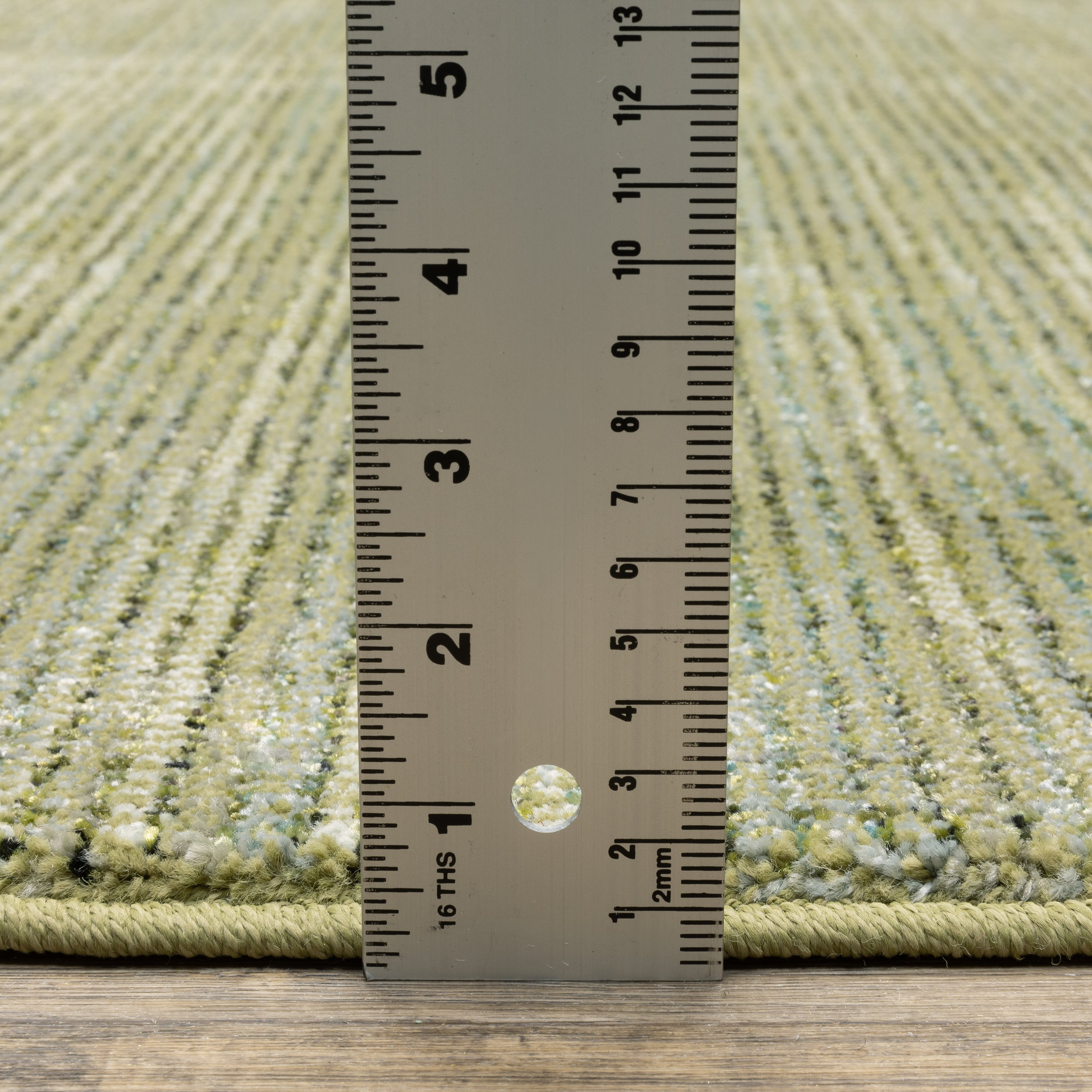 Oriental Weavers Atlas 3723R textured area rug featuring textured design in green/ blue tones