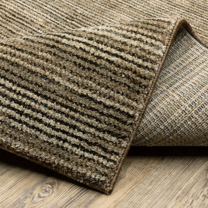 Oriental Weavers Atlas 3723T textured area rug featuring textured design in brown/ beige tones