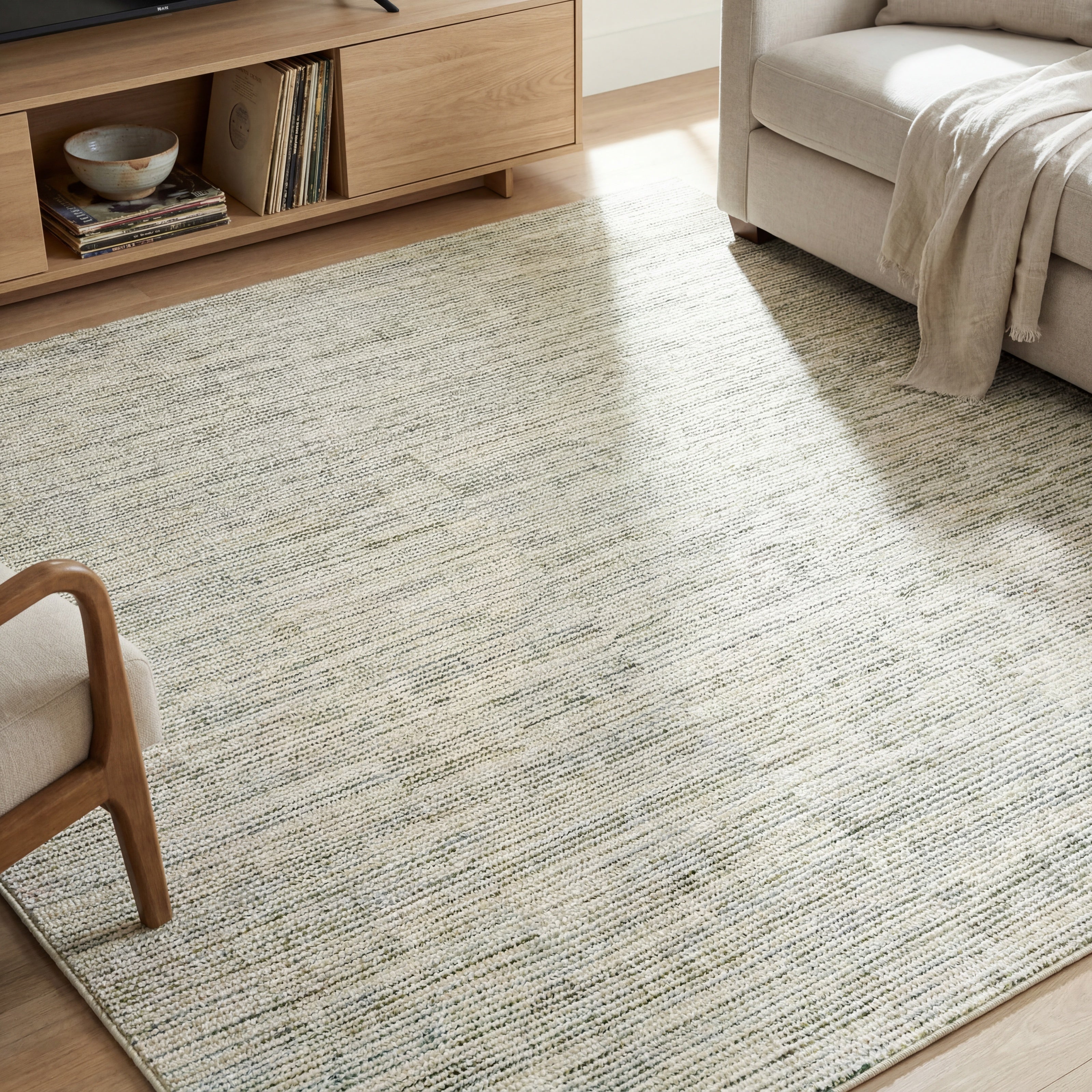 Oriental Weavers Atlas 3723U textured area rug featuring textured design in ivory/ blue tones
