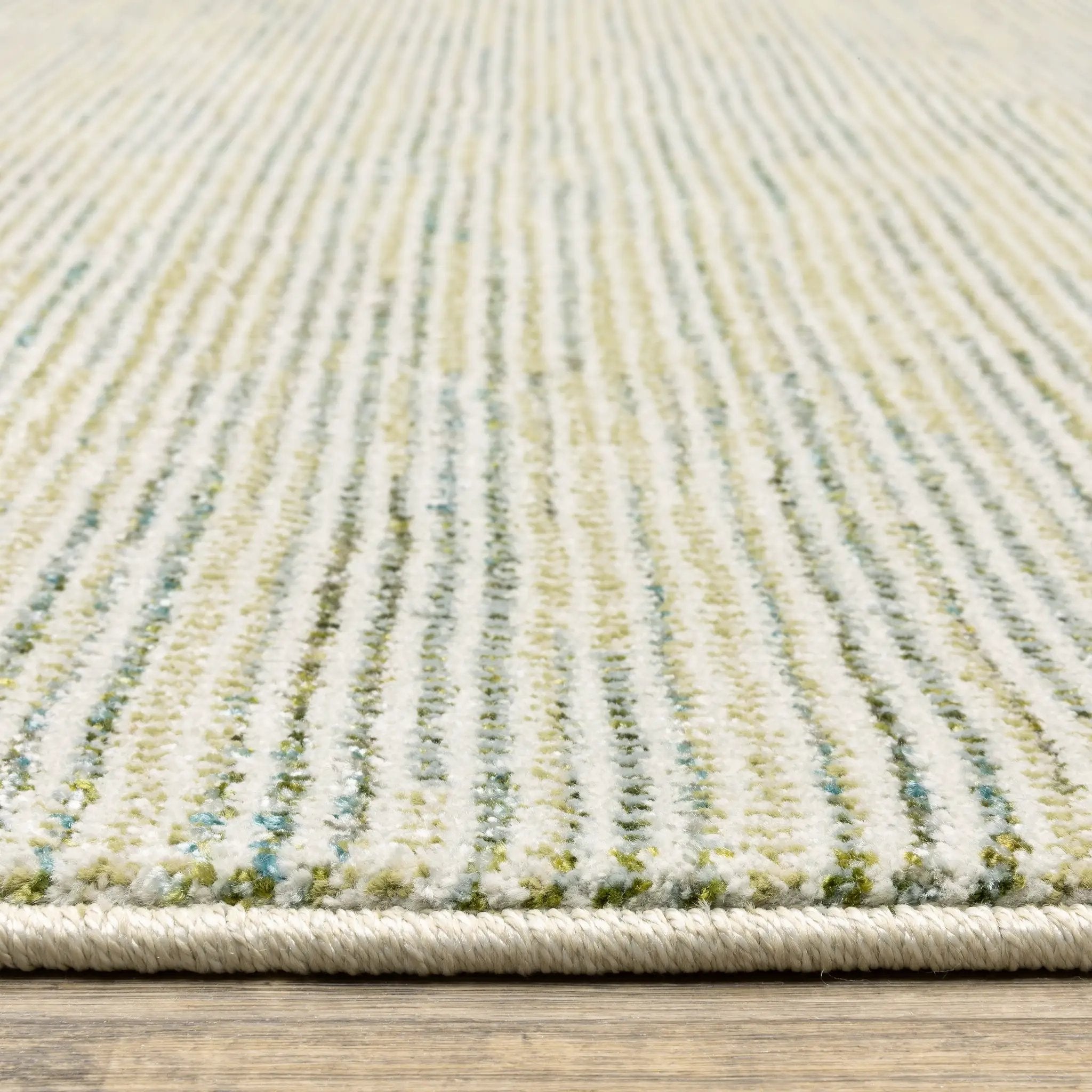 Atlas 3723U Ivory/ Blue Area Rug by Oriental Weavers