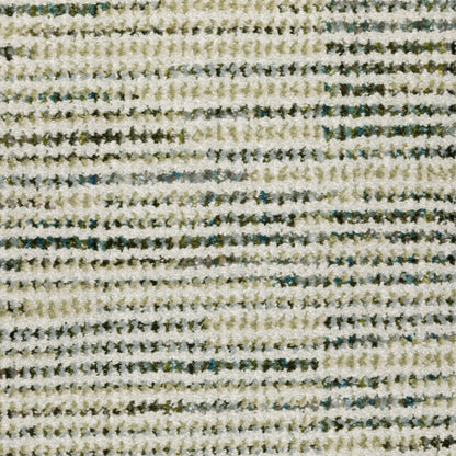 Oriental Weavers Atlas 3723U textured area rug featuring textured design in ivory/ blue tones