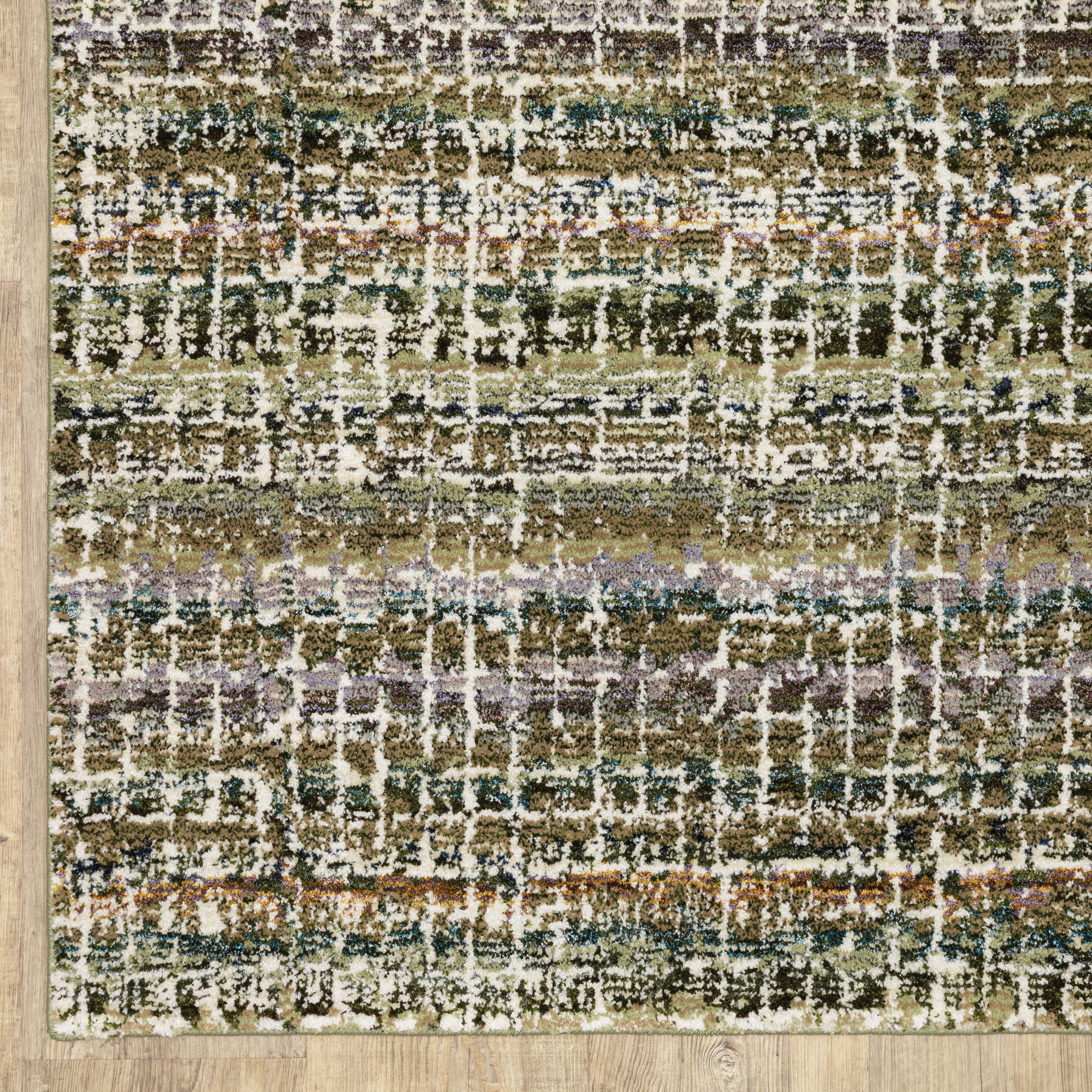 Oriental Weavers Atlas 747A0 textured area rug featuring textured design in green/ multi tones