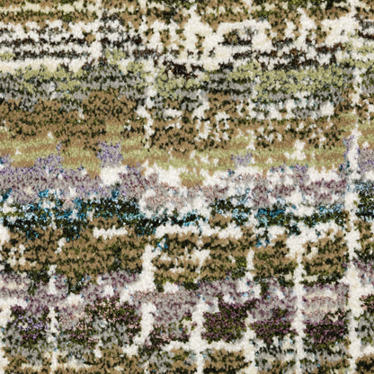 Oriental Weavers Atlas 747A0 textured area rug featuring textured design in green/ multi tones