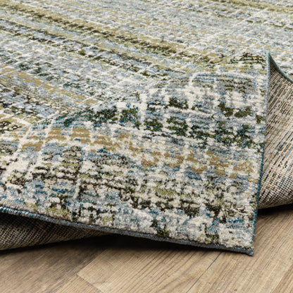 Oriental Weavers Atlas 747B0 textured area rug featuring textured design in blue/ green tones