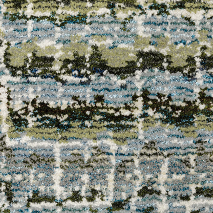 Oriental Weavers Atlas 747B0 textured area rug featuring textured design in blue/ green tones