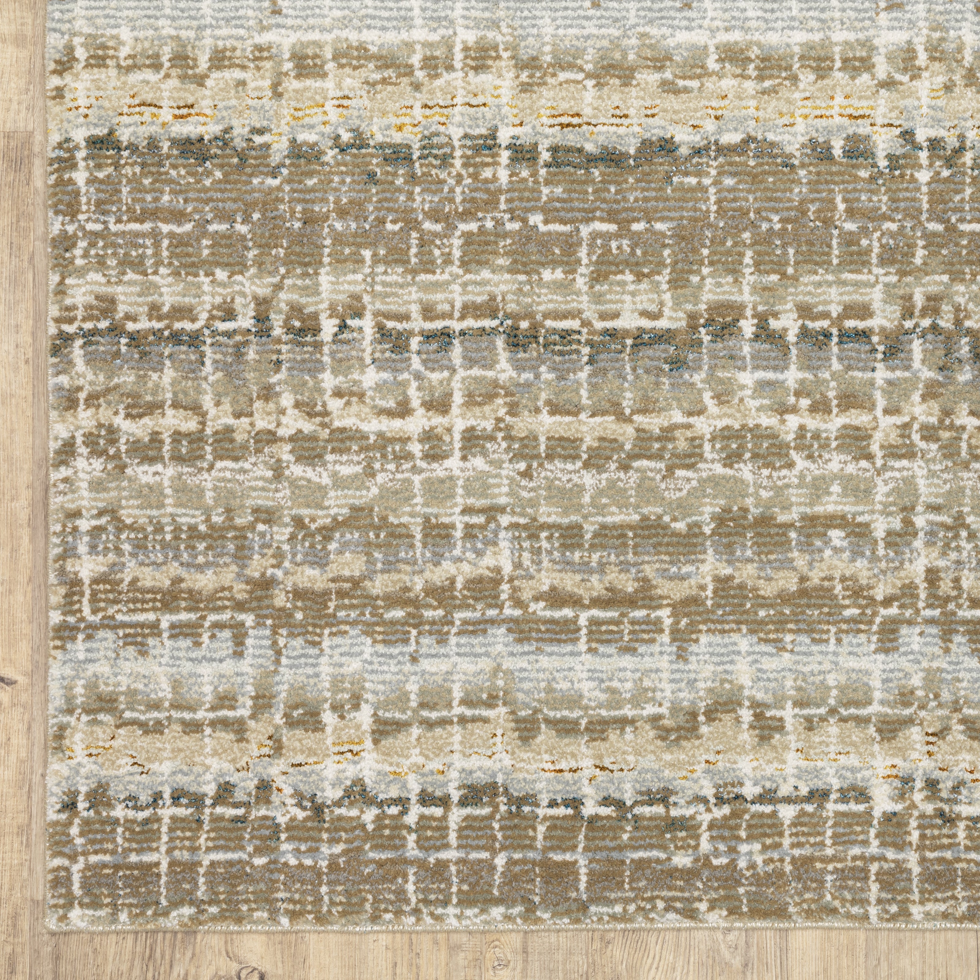 Oriental Weavers Atlas 747E0 textured area rug featuring textured design in ivory/ grey tones