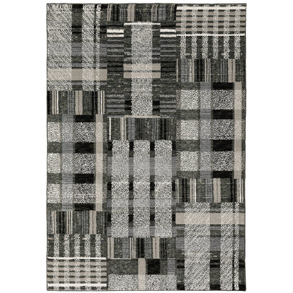 Oriental Weavers Atlas 752C0 textured area rug featuring textured design in black/ grey tones