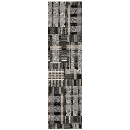 Oriental Weavers Atlas 752C0 textured area rug featuring textured design in black/ grey tones
