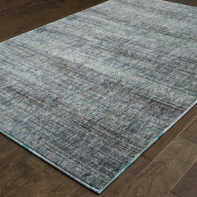 Oriental Weavers Atlas 8033J textured traditional rug featuring textured design in blue/ grey tones