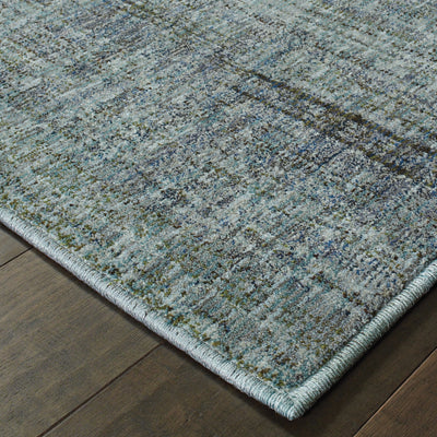 Oriental Weavers Atlas 8033J textured traditional rug featuring textured design in blue/ grey tones