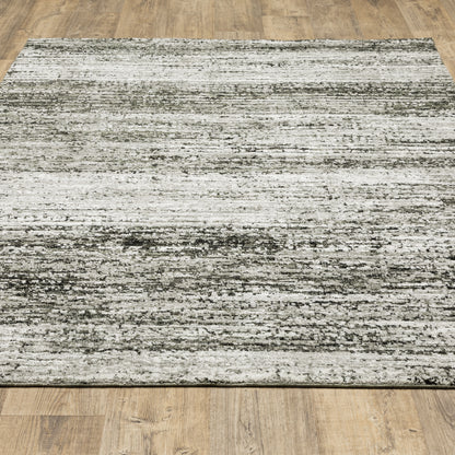 Oriental Weavers Atlas 8037G textured area rug featuring textured design in ash/ charcoal tones
