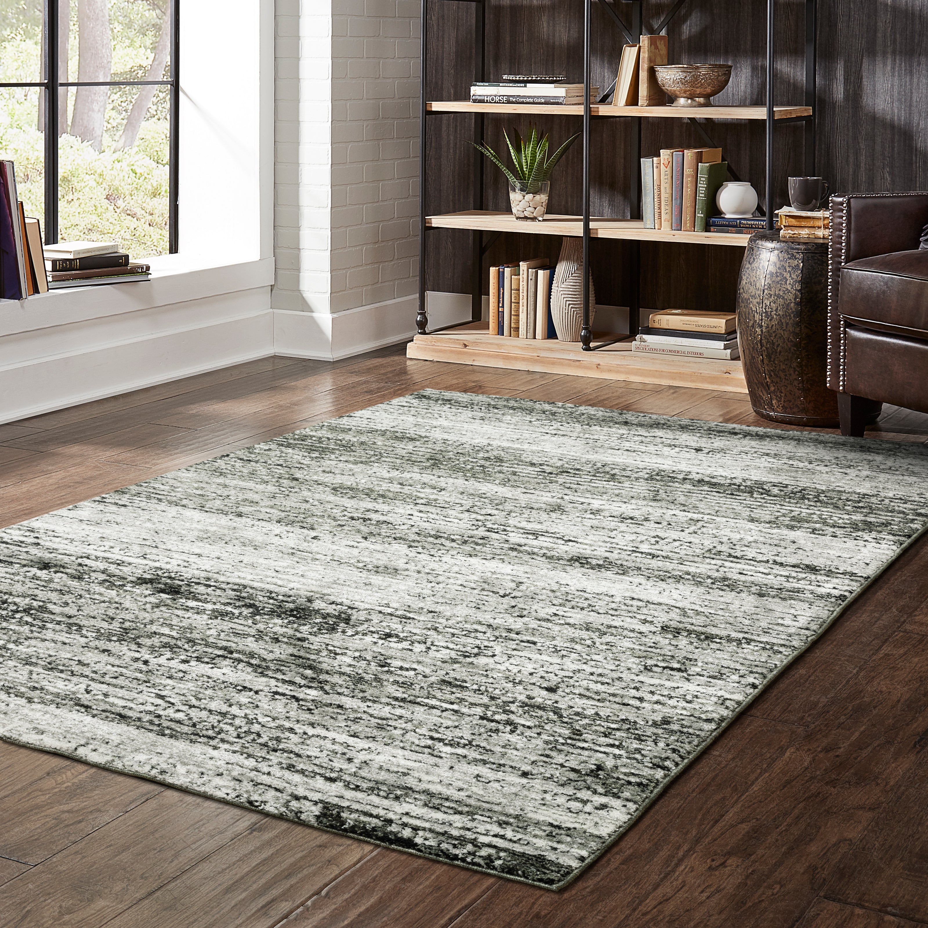 Oriental Weavers Atlas 8037G textured area rug featuring textured design in ash/ charcoal tones