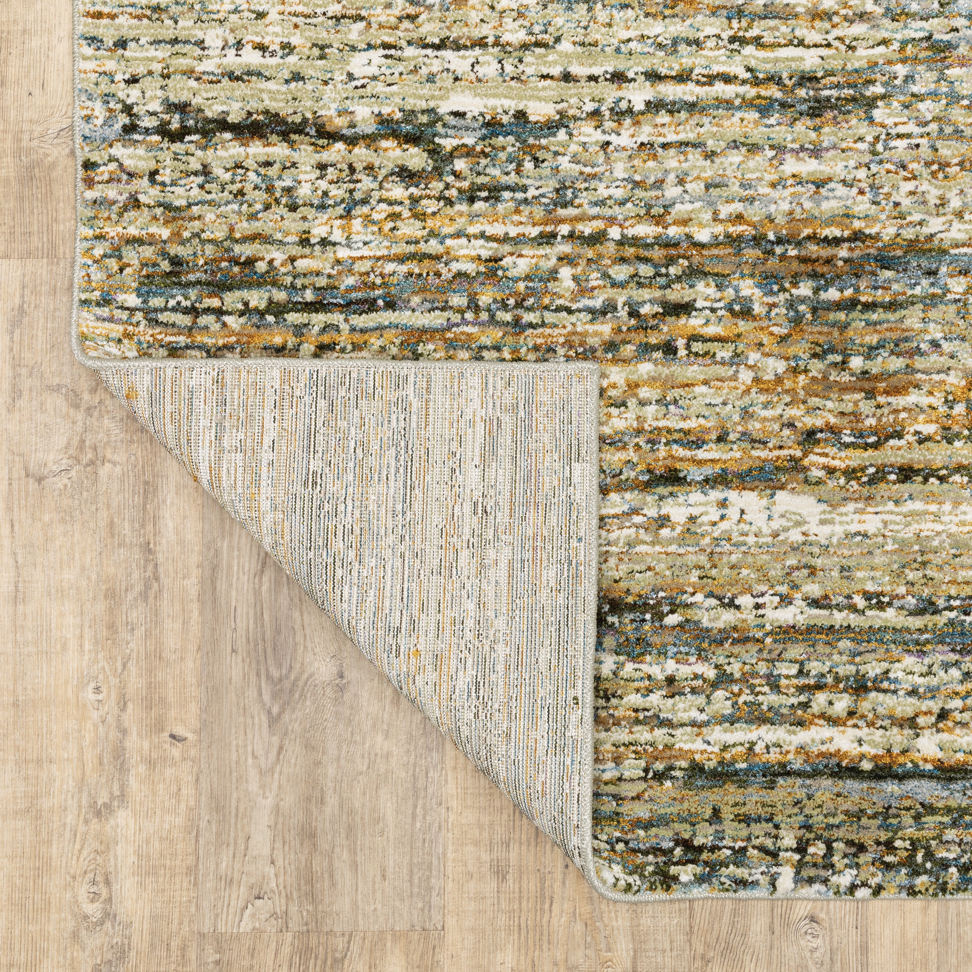 Oriental Weavers Atlas 8037J textured area rug featuring textured design in gold/ green tones